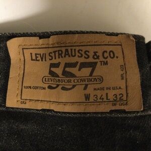 vintage Levi’s 557 33x30 (meas) black cowboys ex condition